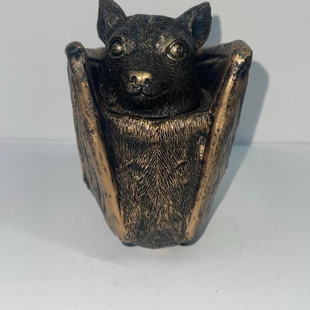 Black bat shaped vase with gold